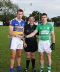 St.Mary’s Rasharkin Team Captain Paul Doherty, Erins Own Captain Tony Scullion with referee Gregory Walsh (St.Mary’s Aghagallon).